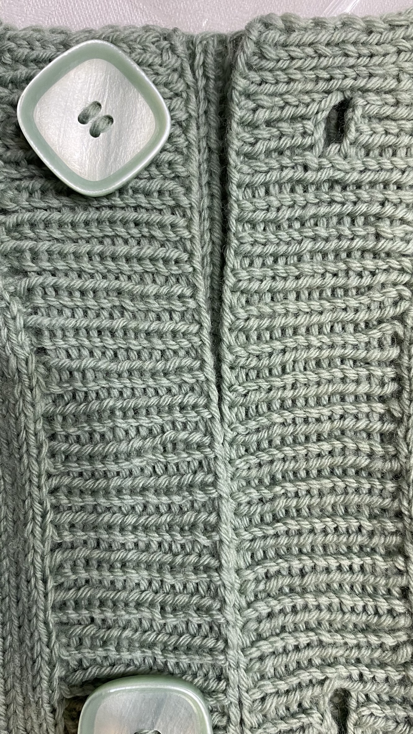 Knopf und Knopfloch Damen